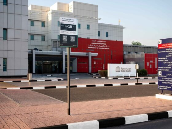 Rashid Hospital’s Emergency and Trauma Center, with parking information displayed outside.