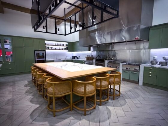 Chef JKP teaching kitchen with demonstration island and stools