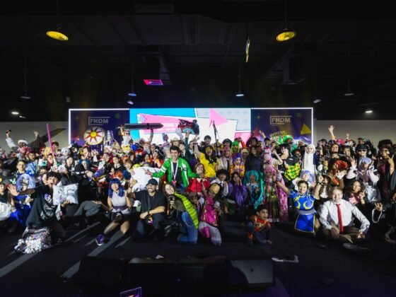Cosplayers gather in front of the FNDM stage at a previous edition